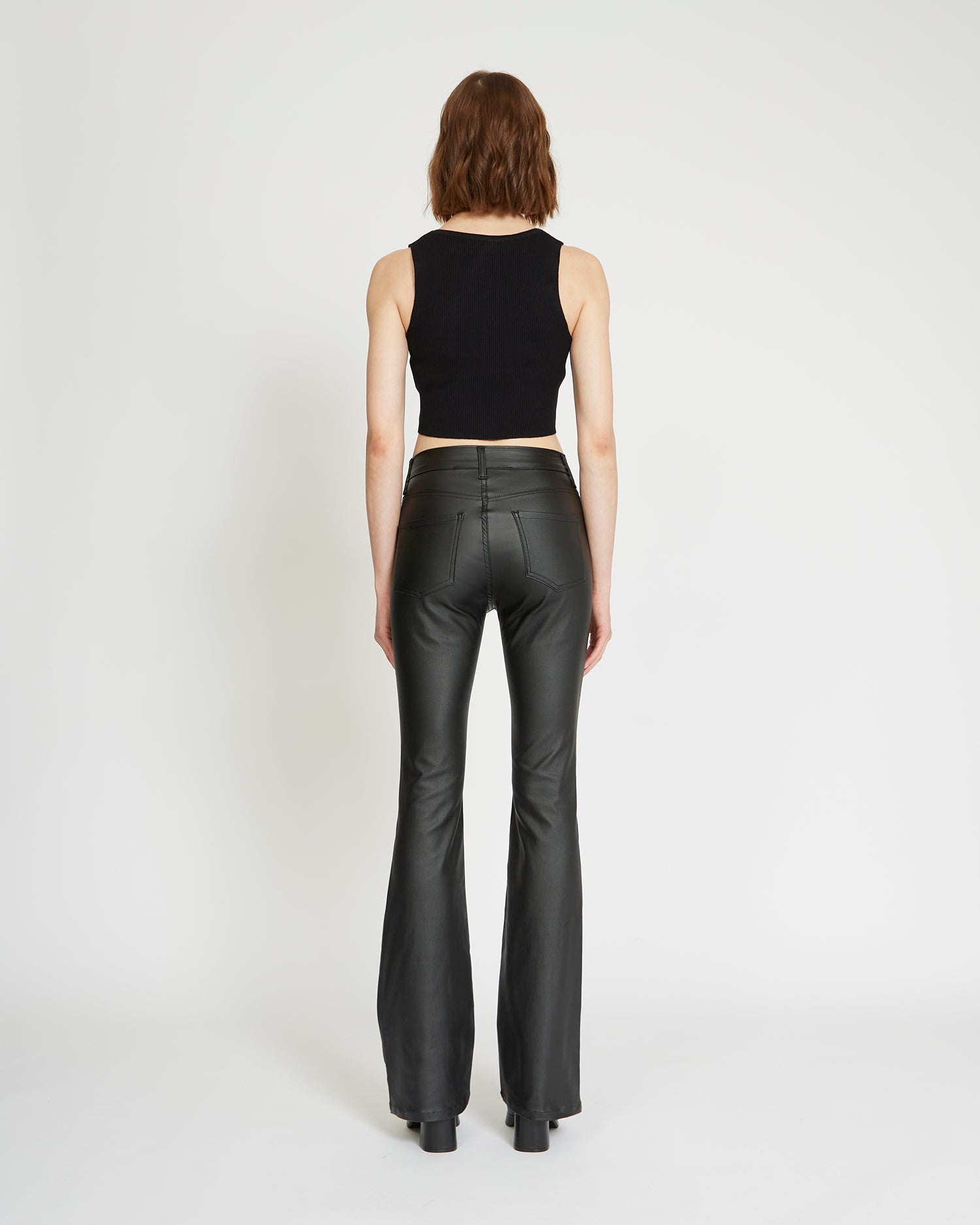 Walk Away Faux Leather Flare Trousers In Black | Oh Polly